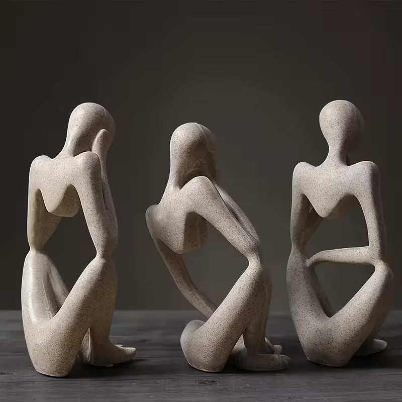 Collectible Figurines, a Set of Three