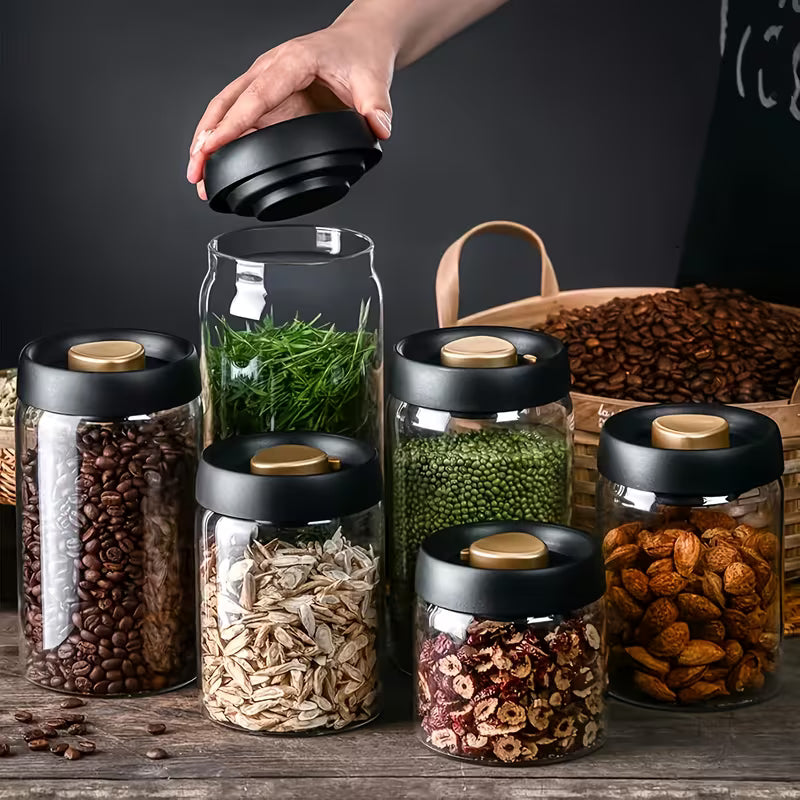 Three Large Vacuum-Sealed Jars for Home And Kitchen Use, Including a Spice Jar And a Glass