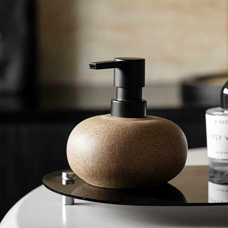 A Ceramic Soap Dispenser in Wabi-Sabi Style Featuring a Minimalist Design, Designed